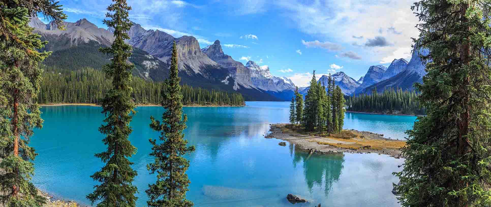 Serene Canadian Lake reflecting the breathtaking beauty of nature.