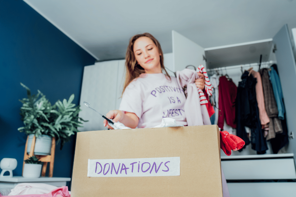 decluttering home sorting items keep donate recycle boxes
