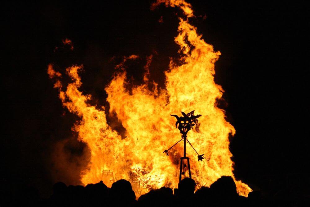 An image of a bonfire with a Guy Fawkes doll