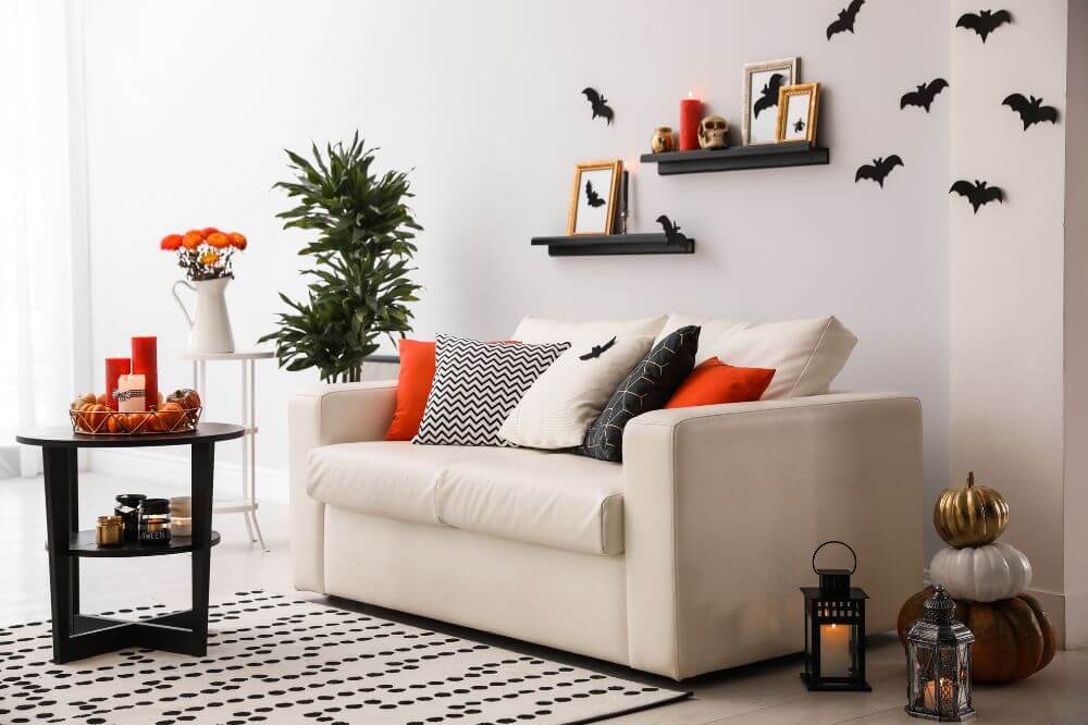 An image showing an living room decorated for Halloween. 