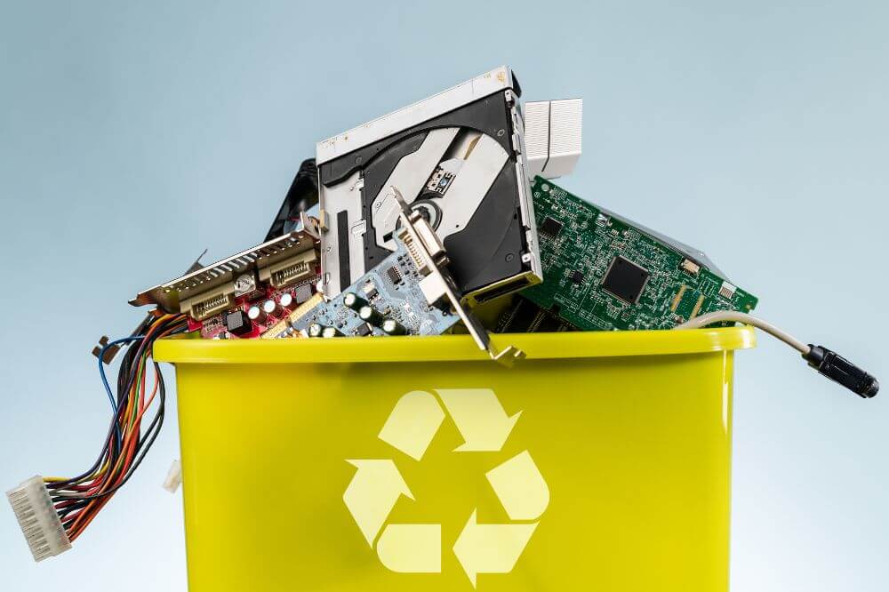 Recycling bin full of electronics. Recycling responsibly to protect wildlife conservation