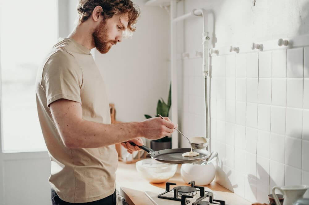 Man looking after himself after recently moving home