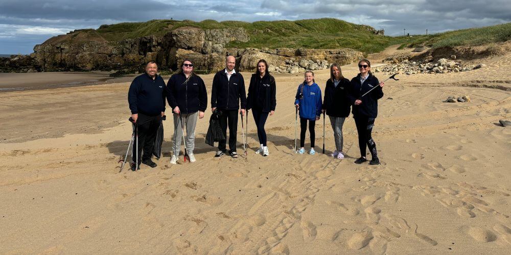 Pickfords participate in a beach clean on South Shields beach